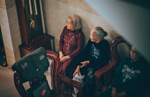 Three old woman waiting